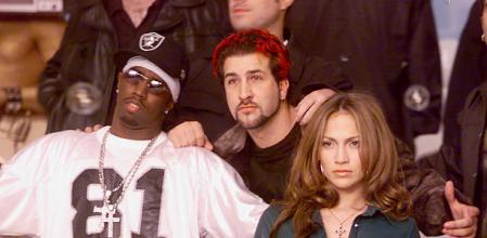 Los Angeles, CA, February 21, 2000 ? MTV: MUSIC TELEVISION brought together Grammy?nominated artists for a special edition of 'Total Request Live' and a unique photo shot by David LaChapelle.  Many of these artists became stars or enjoyed even greater popularity through their exposure on 'TRL.'  The 'TRL' class photo will be turned into a poster and sold via MTV.com with proceeds going to charity.  L?R: Sean 'Puffy' Combs, Joey Fatone of 'NSYNC, and Jennifer Lopez  pose for the photo.  Other artists participating in the shoot included Britney Spears,  Limp Bizkit, Christina Aguilera,  Lenny Kravitz, Tyrese, Destiny's Child and Goo Goo Dolls. (Photo by Scott Gries/ImageDirect